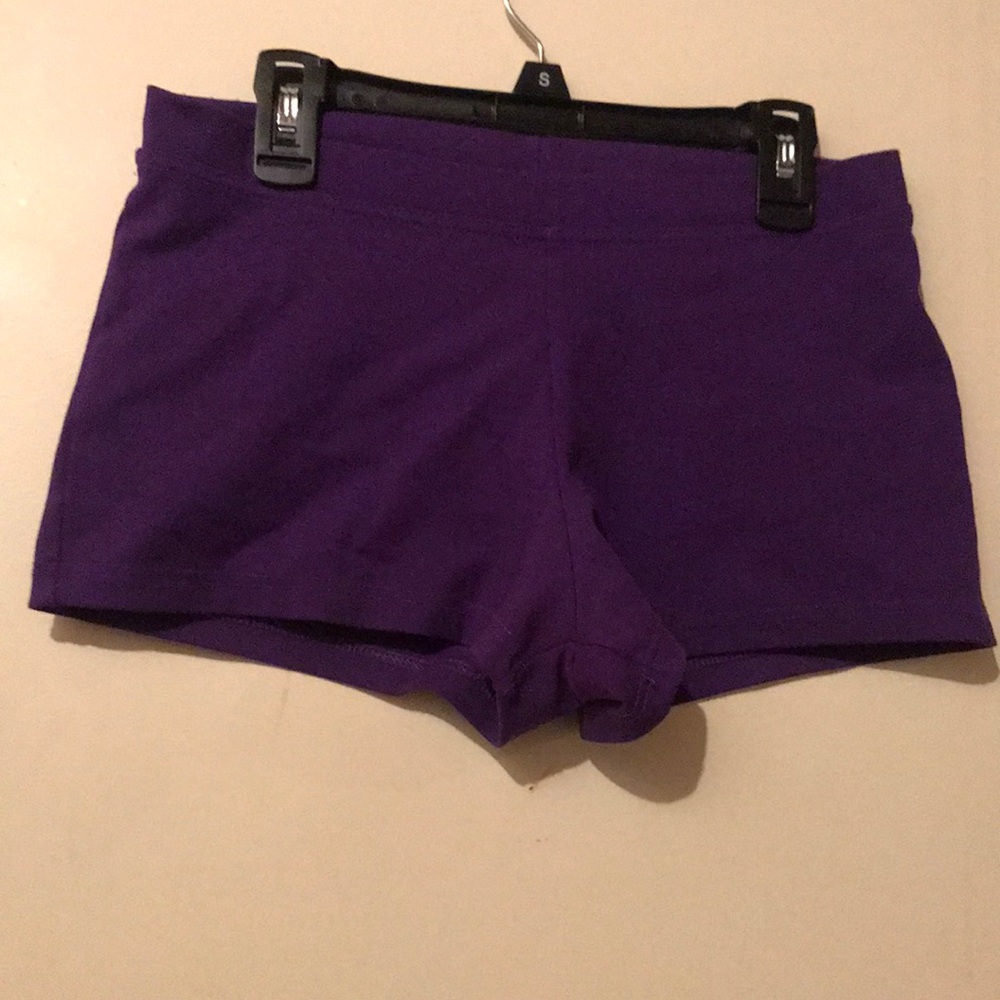 purple low rise shorts.